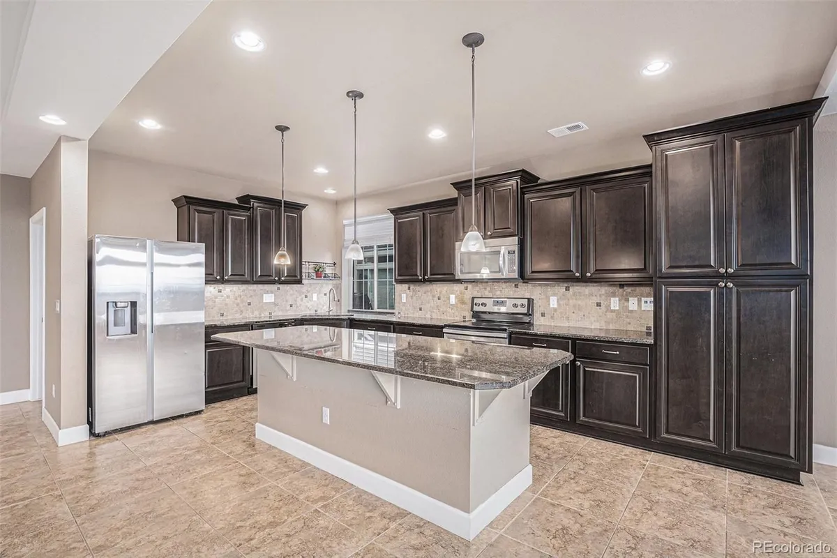 Property Slideshow image 1 of 28 | 5521 ensenada st, Denver, CO, 80249