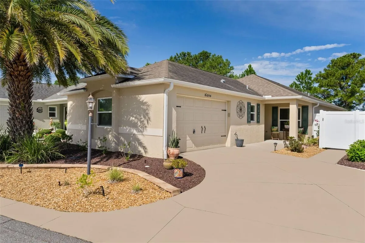 Property Slideshow image 1 of 49 | 16844 se 91st phillips ct, The Villages, FL, 32162
