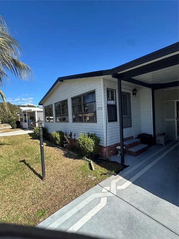 Property Slideshow image 1 of 19 | 1710 lilly ln, Lady Lake, FL, 32159