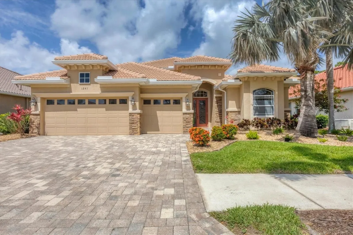 Property Slideshow image 1 of 70 | 1241 creek nine dr, North Port, FL, 34291