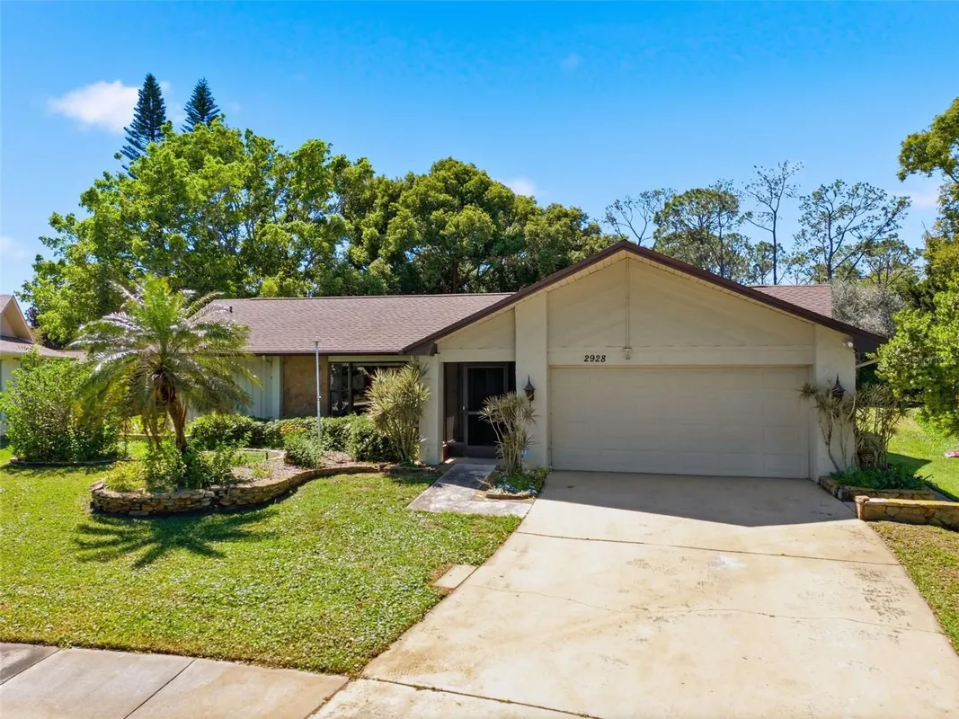 Property Slideshow image 1 of 40 | 2928 macalpin dr, Palm Harbor, FL, 34684
