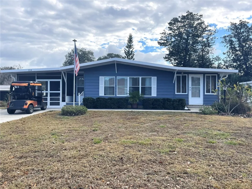 Property Slideshow image 1 of 32 | 116 winterberry ave, Wildwood, FL, 34785