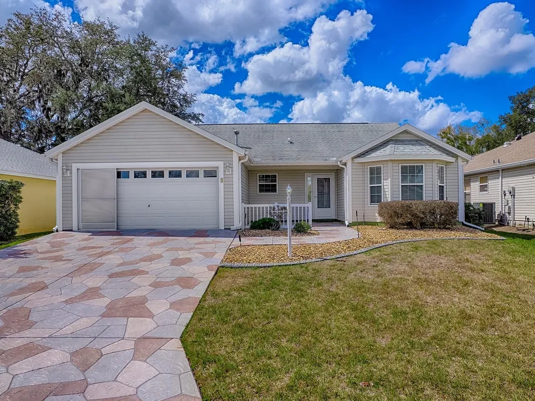 Property Slideshow image 1 of 34 | 16865 se 93rd cuthbert cir, The Villages, FL, 32162