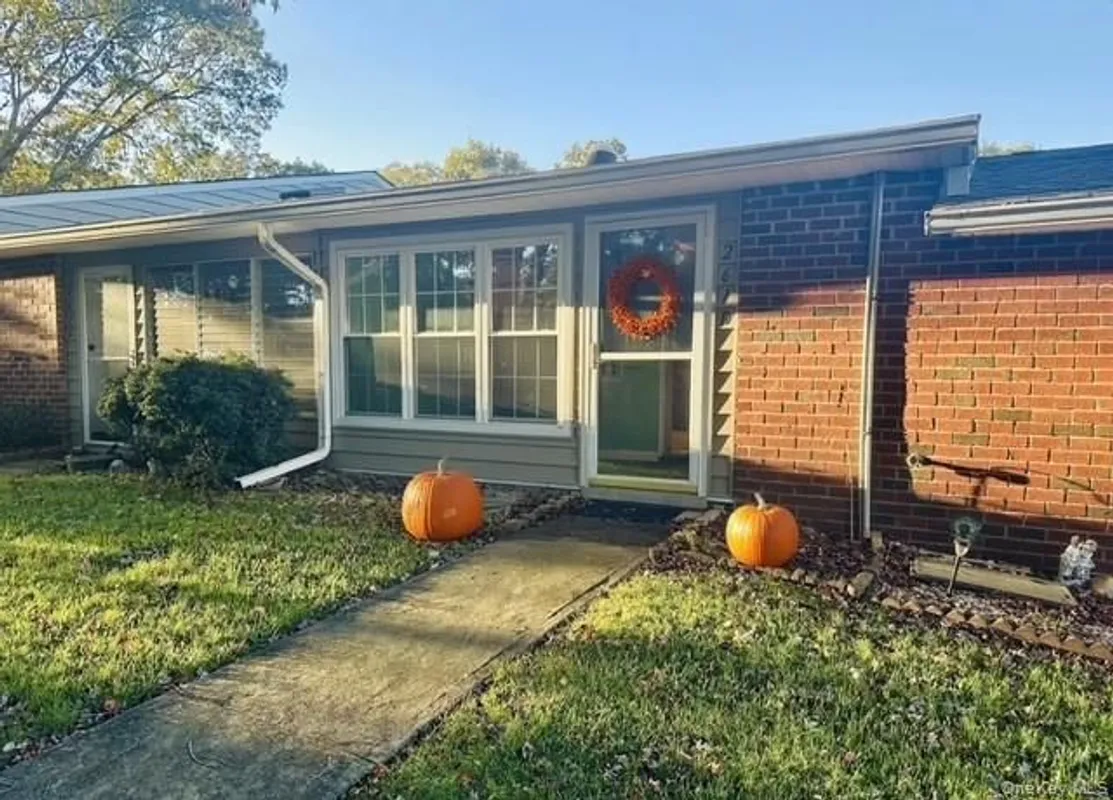 Property Slideshow image 1 of 24 | 261 newcastle ct unit d, Ridge, NY, 11961