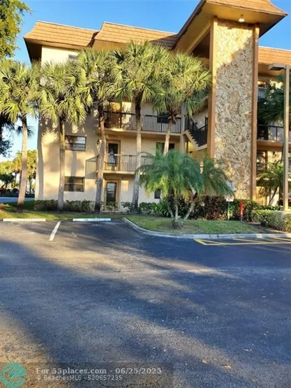 Property Slideshow image 1 of 16 | 4965 e sabal palm blvd 201, Tamarac, FL, 33319