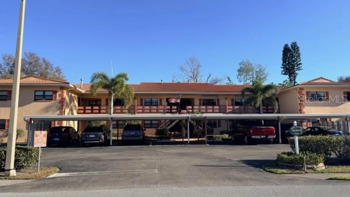 Property Slideshow image 1 of 26 | 8140 terrace garden dr 204, St Petersburg, FL, 33709