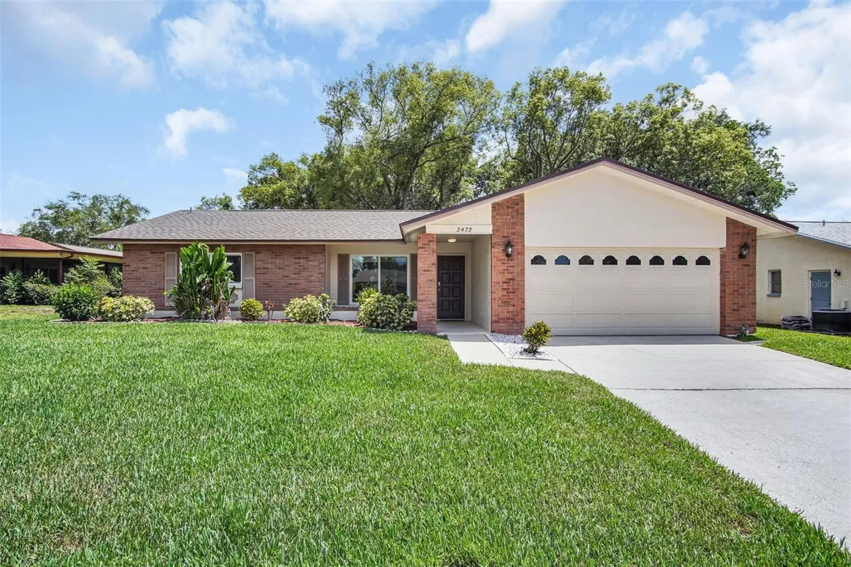 Property Slideshow image 1 of 53 | 2472 malcolm dr, Palm Harbor, FL, 34684