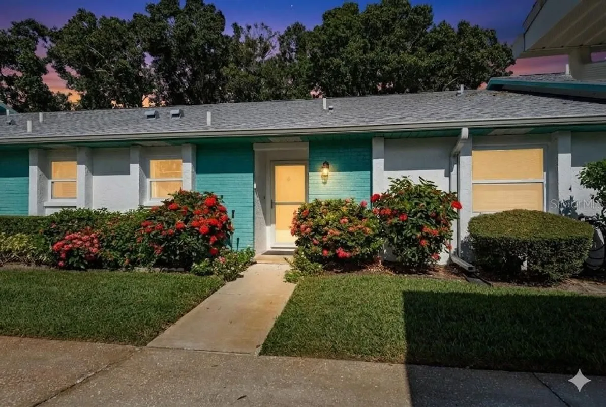 Property Slideshow image 1 of 63 | 1109 tartan dr c, Palm Harbor, FL, 34684