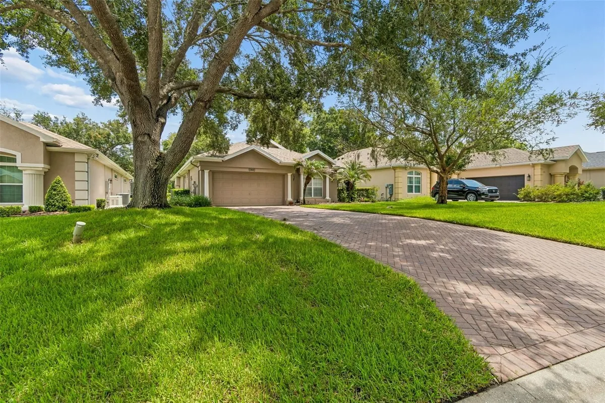 Property Slideshow image 1 of 64 | 12442 forest highlands dr, Dade City, FL, 33525