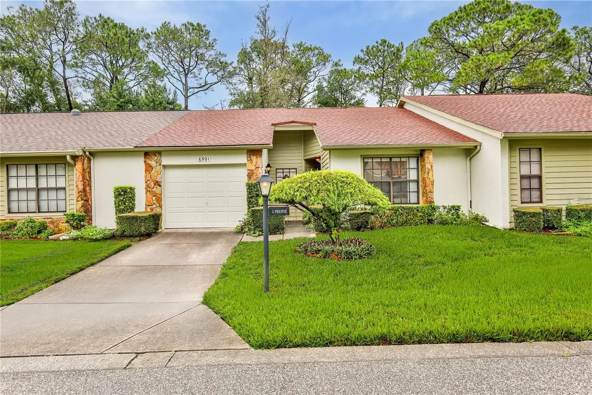 Property Slideshow image 1 of 45 | 6591 brambleleaf dr, Spring Hill, FL, 34606