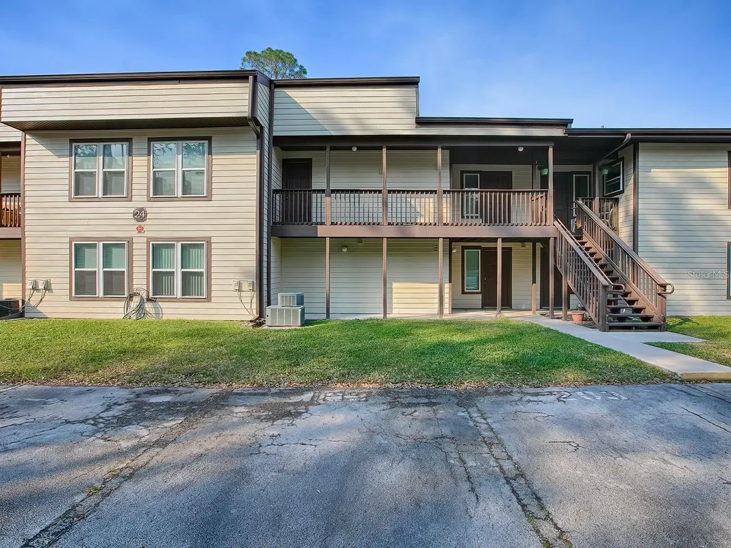 Property Slideshow image 1 of 17 | 24104 sandalwood dr 104, Wildwood, FL, 34785