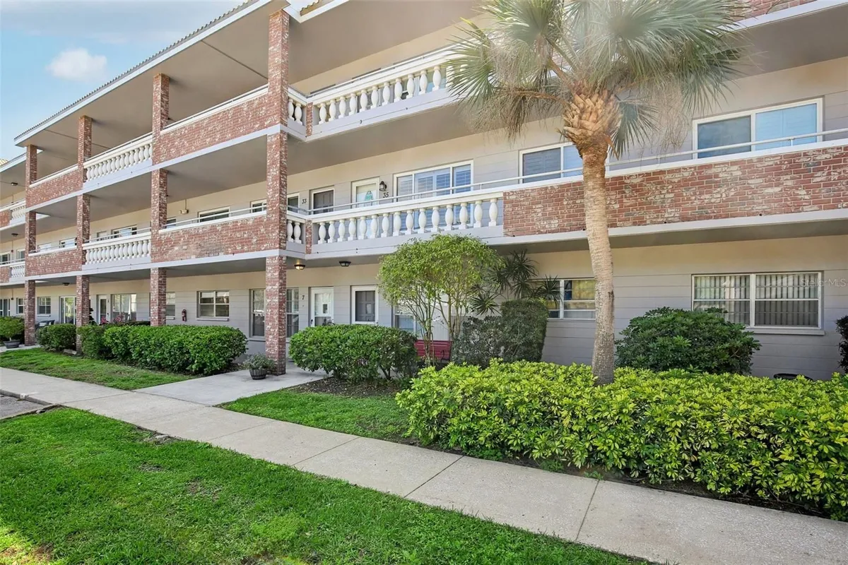 Property Slideshow image 1 of 28 | 2461 rhodesian dr 7, Clearwater, FL, 33763
