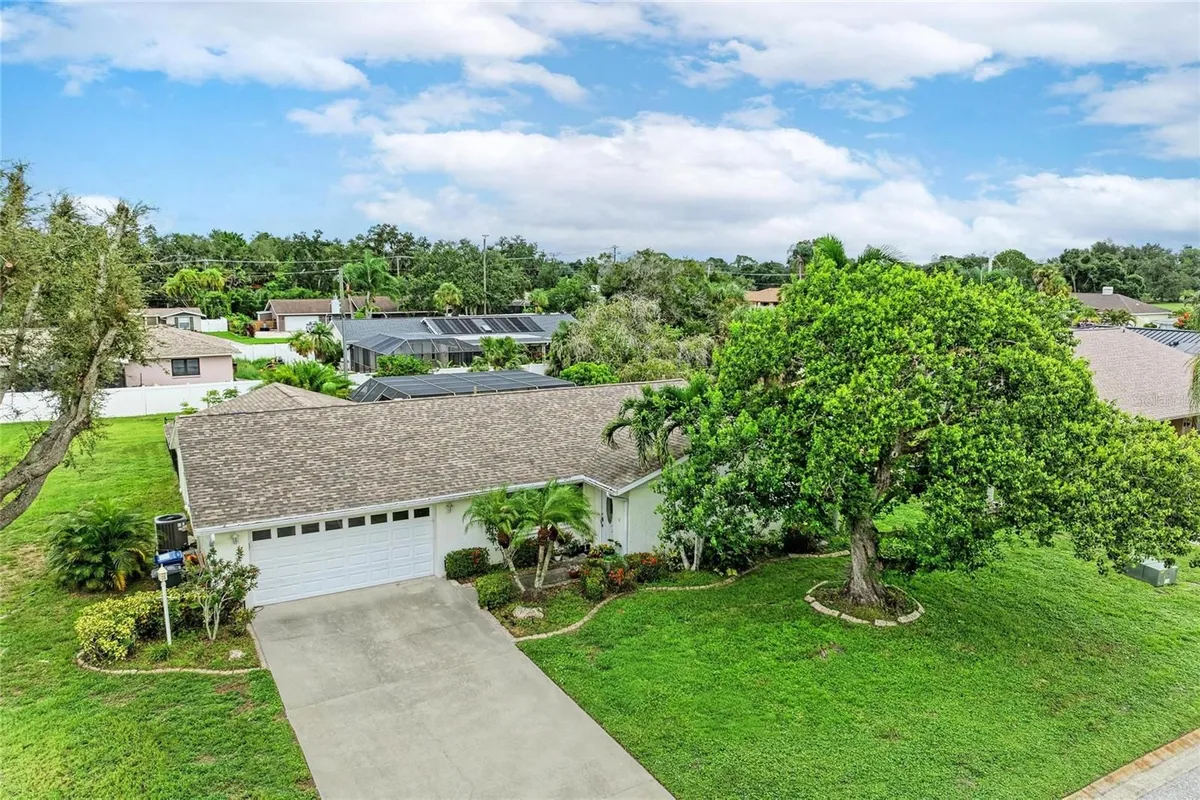 Property Slideshow image 1 of 65 | 4723 palm aire cir, Sarasota, FL, 34243
