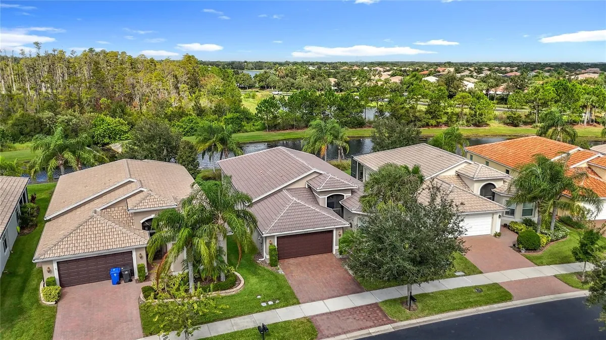 Property Slideshow image 1 of 80 | 16113 cape coral dr, Wimauma, FL, 33598