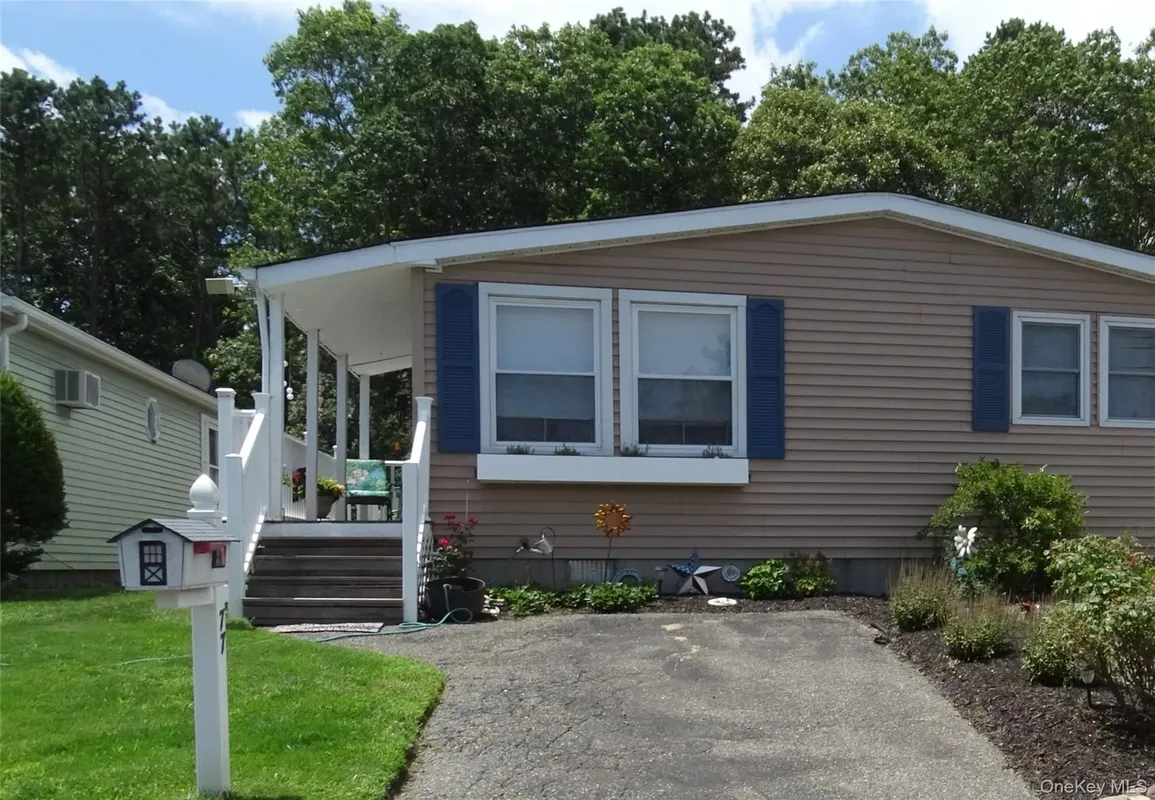 Property Slideshow image 1 of 31 | 77 village cir, Manorville, NY, 11949