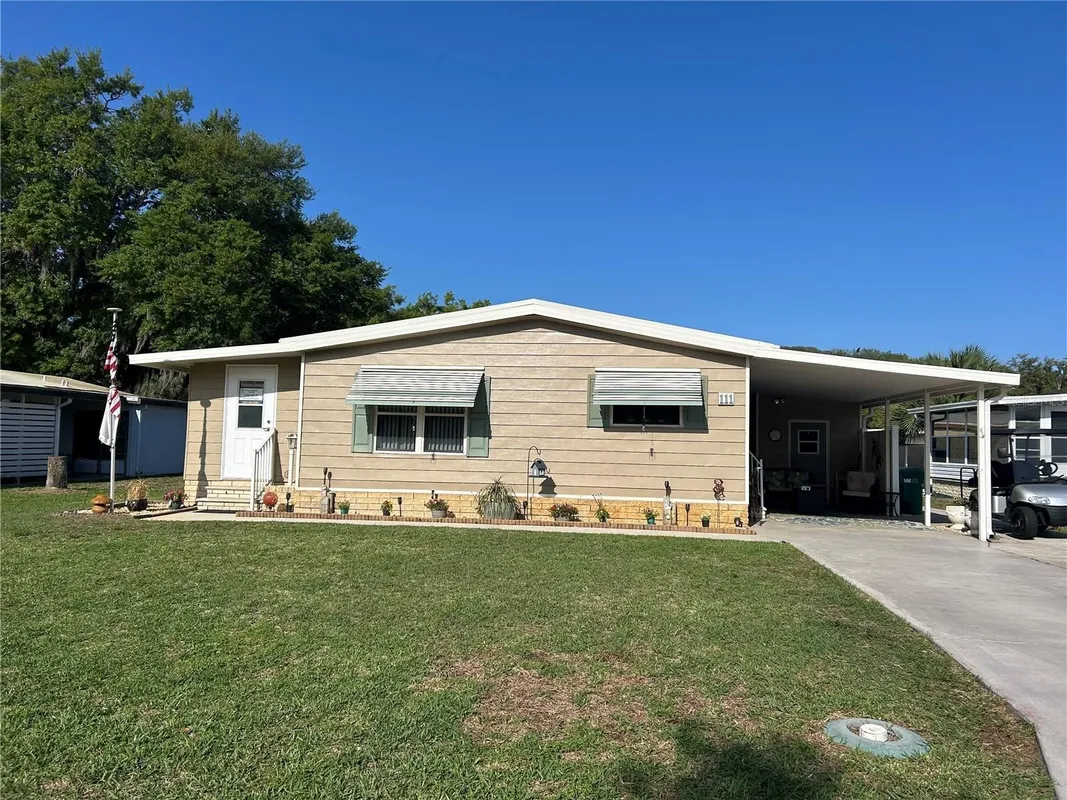 Property Slideshow image 1 of 17 | 111 winterberry ave, Wildwood, FL, 34785