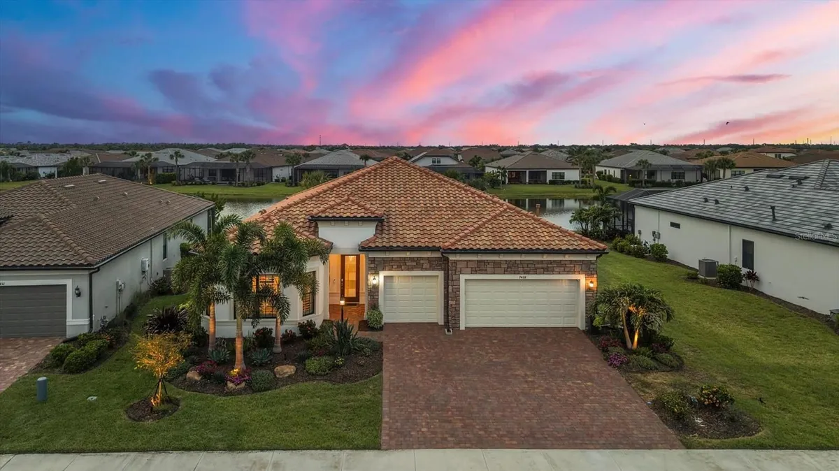 Property Slideshow image 1 of 84 | 7428 summerland cv, Lakewood Ranch, FL, 34202