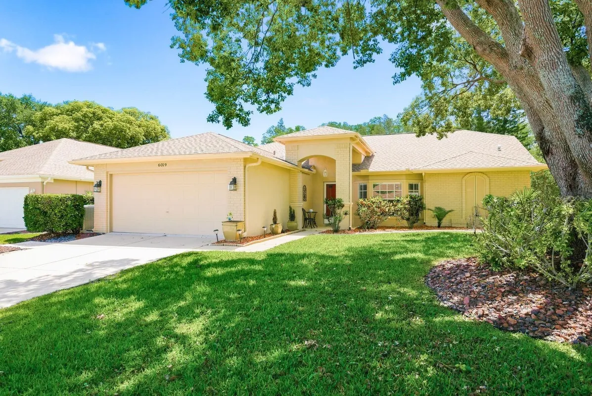 Property Slideshow image 1 of 43 | 6019 country ridge ln, New Port Richey, FL, 34655