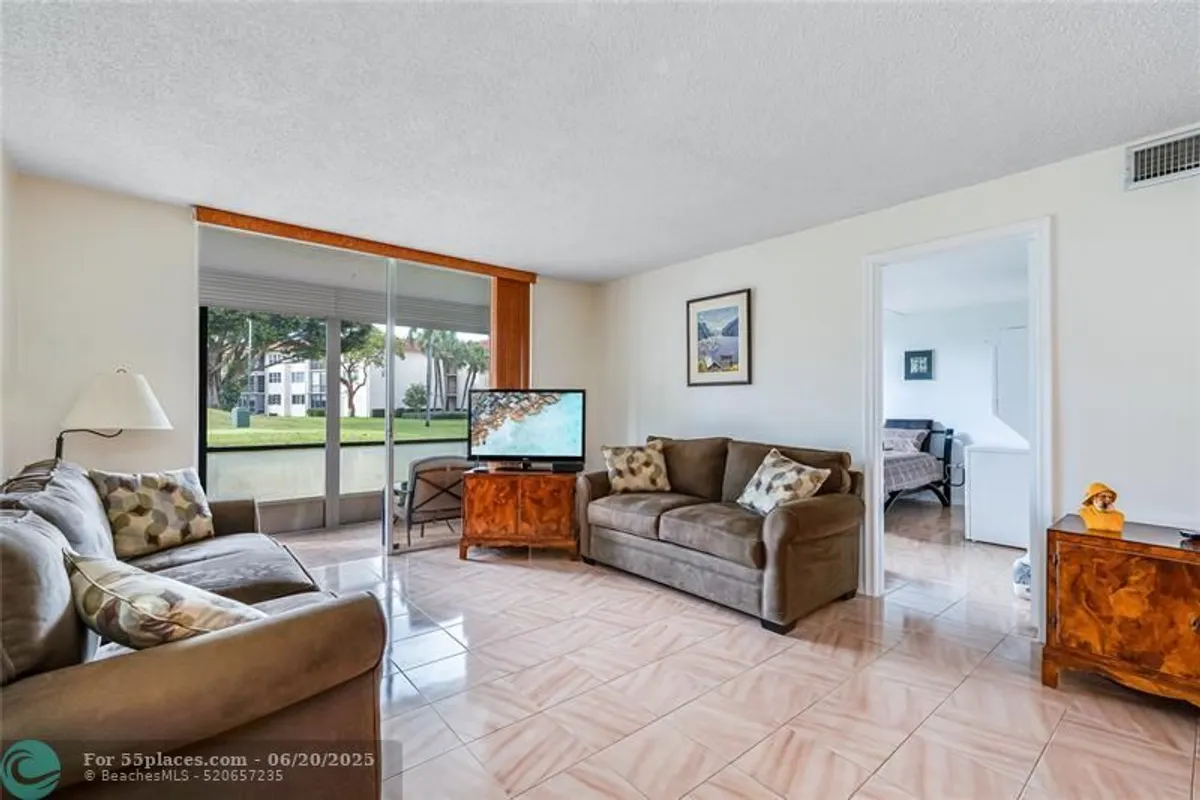 Property Slideshow image 1 of 58 | 811 s hollybrook dr 103, Pembroke Pines, FL, 33025