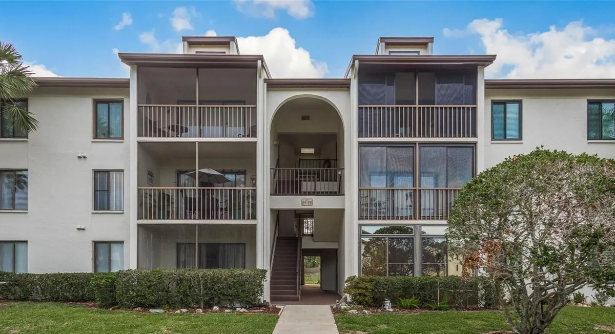Property Slideshow image 1 of 15 | 1871 pine ridge way 2e, Palm Harbor, FL, 34684