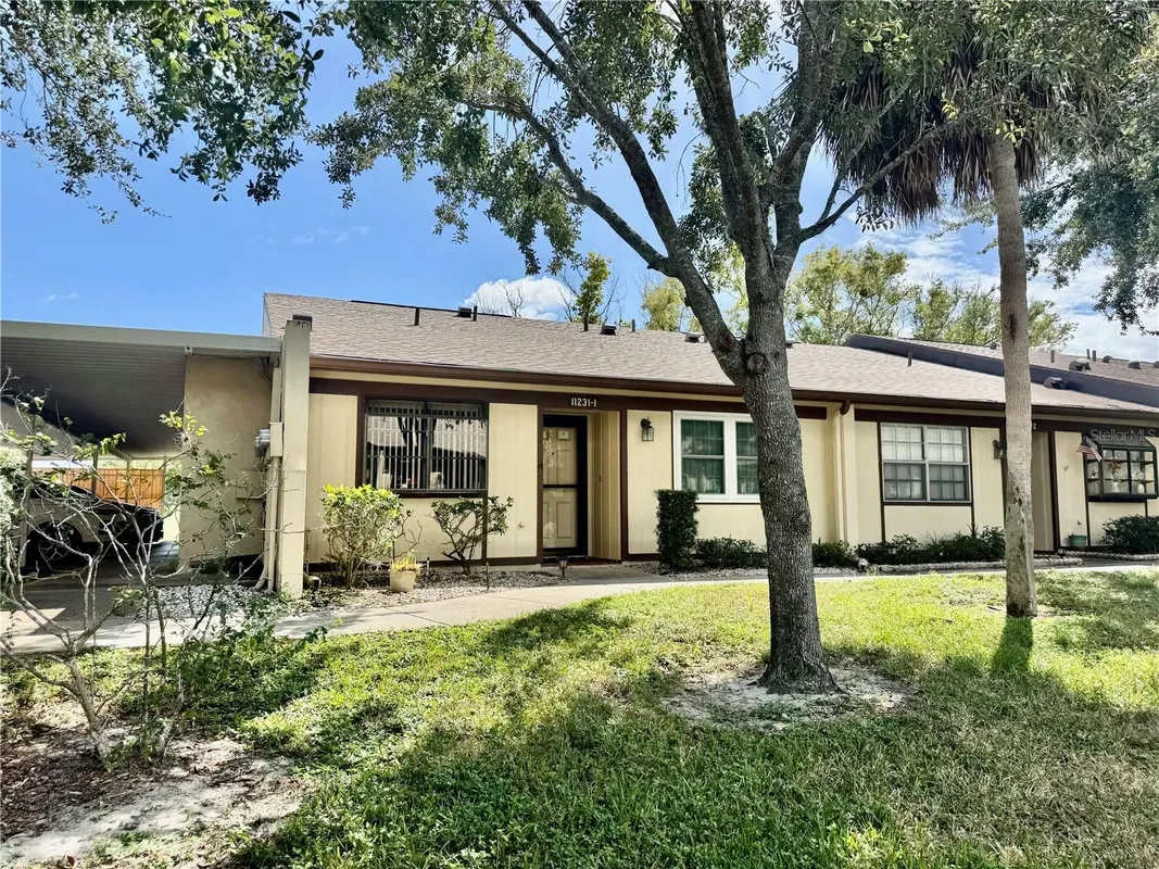 Property Slideshow image 1 of 25 | 11231 dollar lake dr apt 1, Port Richey, FL, 34668