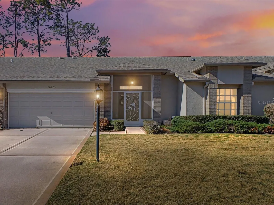 Property Slideshow image 1 of 52 | 11625 baronwood ct, Hudson, FL, 34667