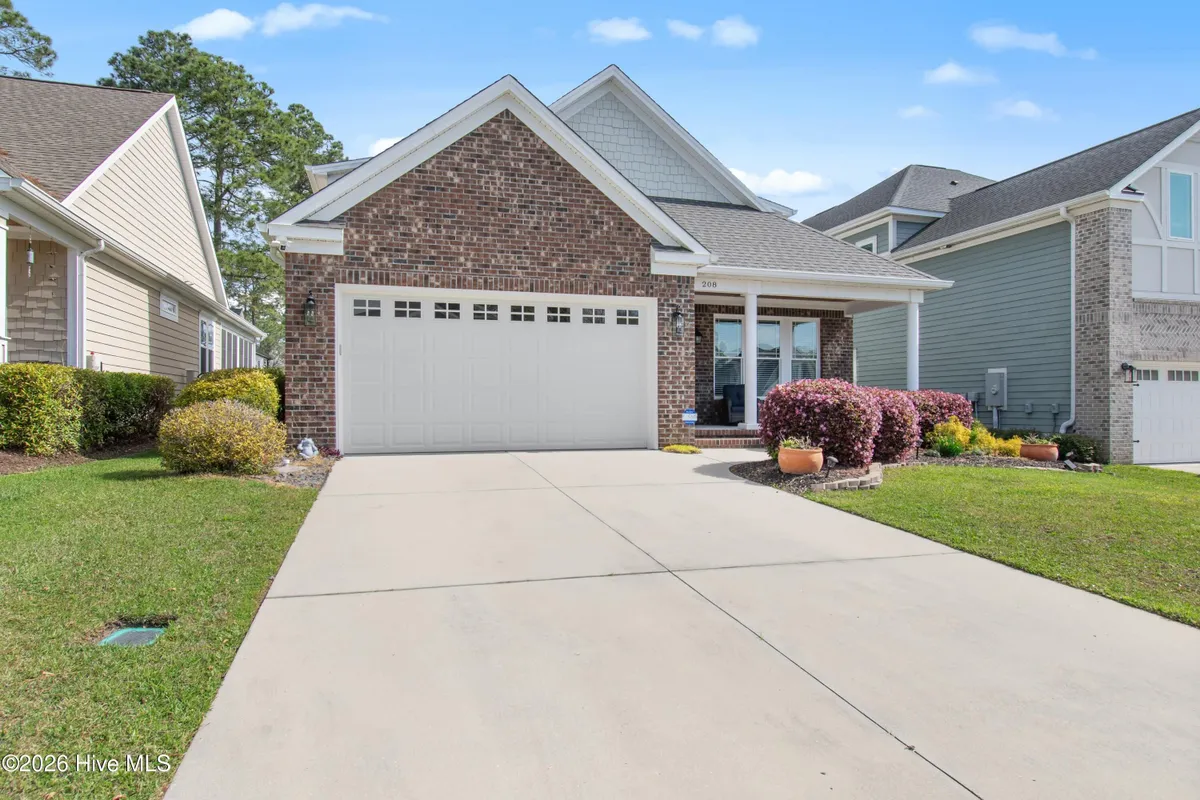 Property Slideshow image 1 of 59 | 208 brookwood park ct, Sunset Beach, NC, 28468