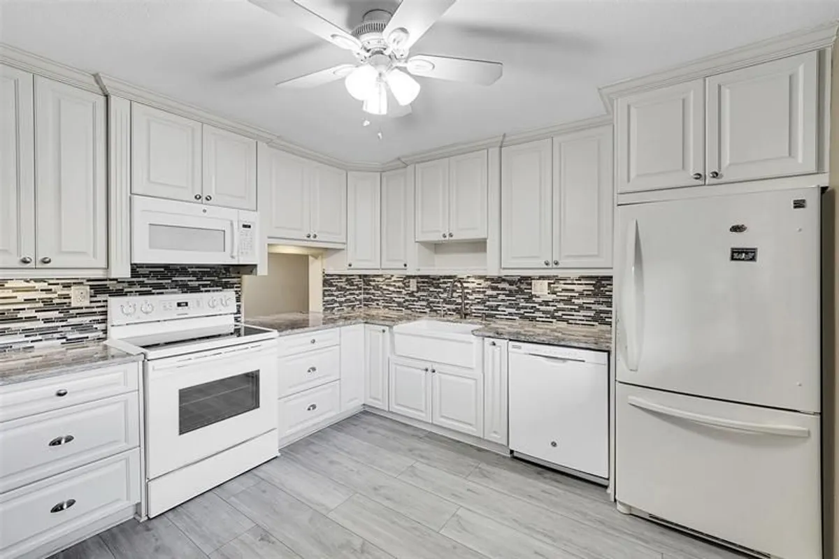 Property Slideshow image 1 of 30 | 4950 e sabal palm blvd 302, Tamarac, FL, 33319