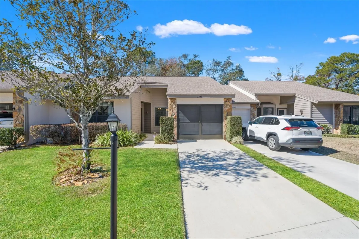 Property Slideshow image 1 of 61 | 2243 wyndam dr, Spring Hill, FL, 34606