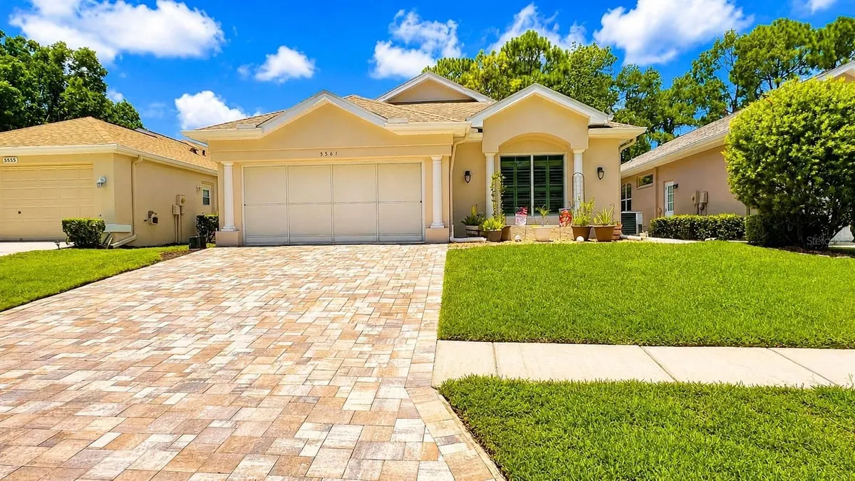 Property Slideshow image 1 of 70 | 5561 legend hills ln, Spring Hill, FL, 34609