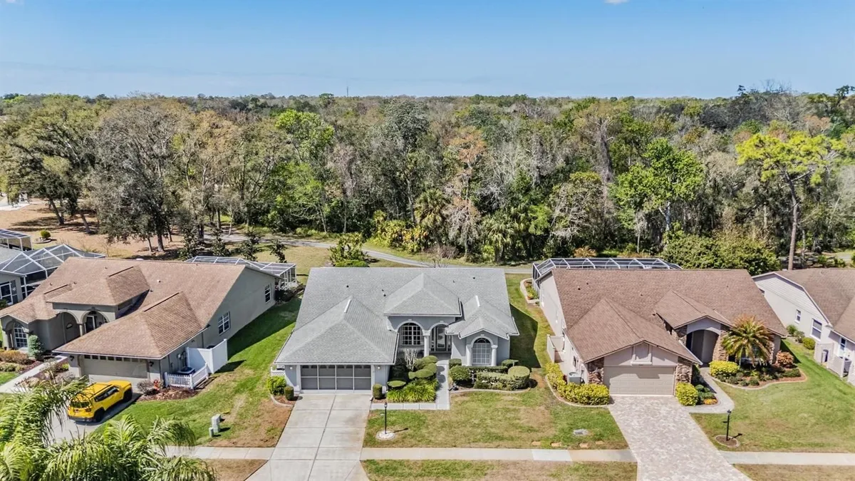 Property Slideshow image 1 of 46 | 9525 springmeadow dr, New Port Richey, FL, 34655