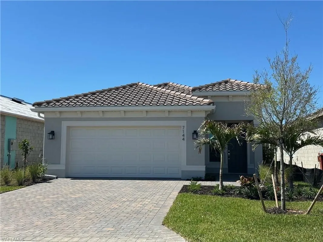 Property Slideshow image 1 of 50 | 7144 chapel creek ln, North Fort Myers, FL, 33917