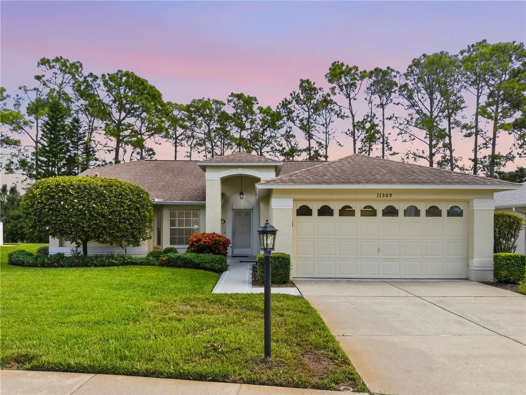 Property Slideshow image 1 of 66 | 11309 sun tree rd, Hudson, FL, 34667
