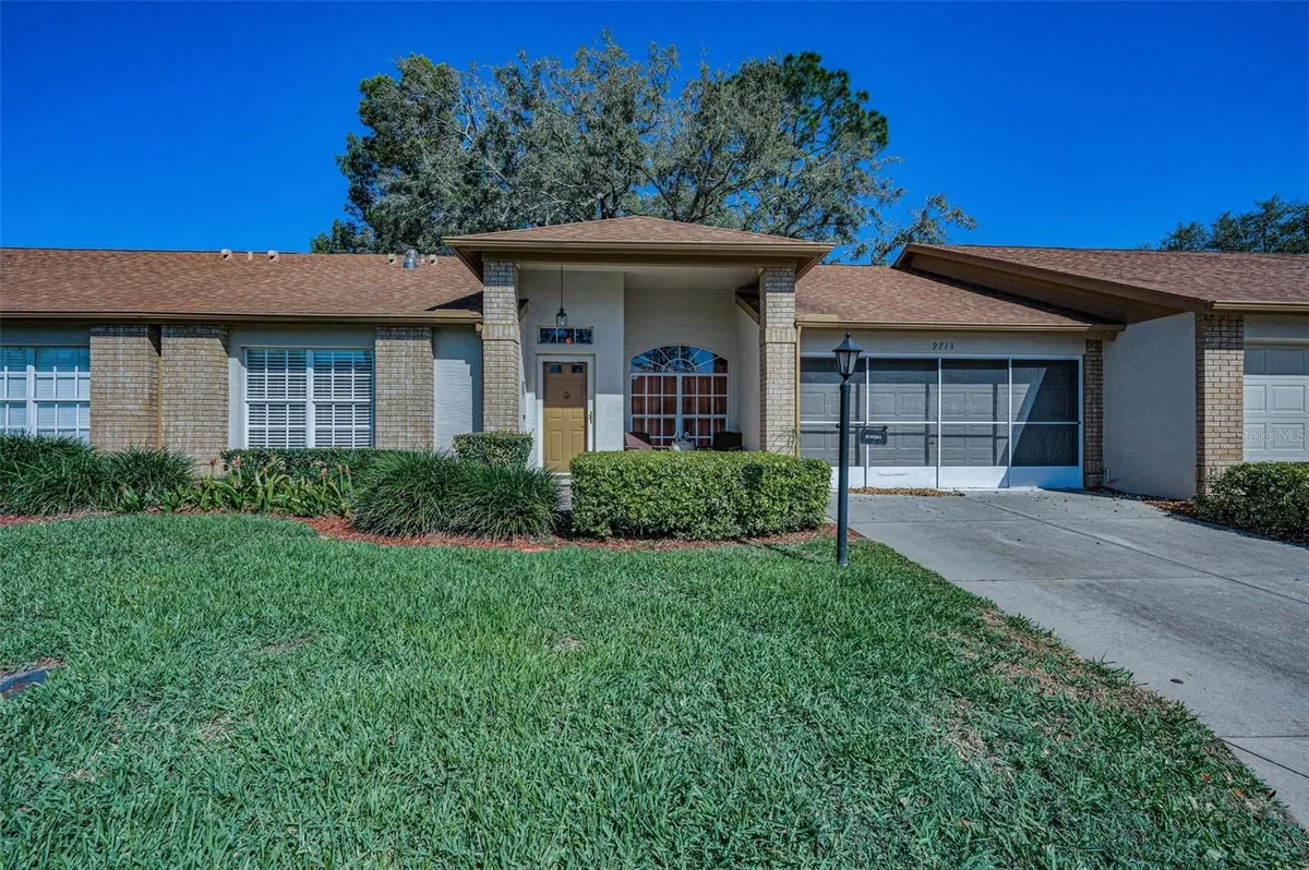 Property Slideshow image 1 of 75 | 9713 sweeping view dr, New Port Richey, FL, 34655
