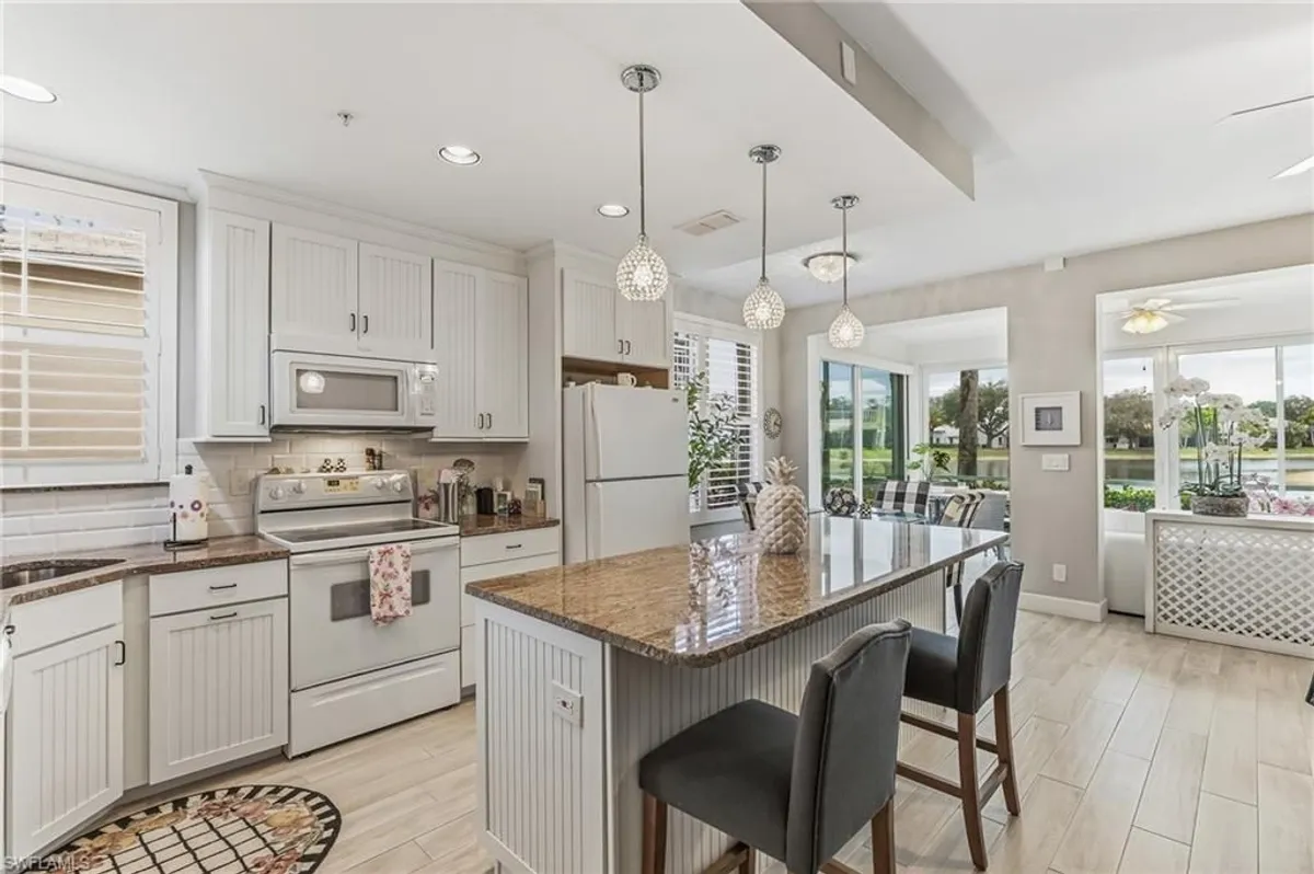 Property Slideshow image 1 of 24 | 24796 lakemont cove ln apt 101, Bonita Springs, FL, 34134