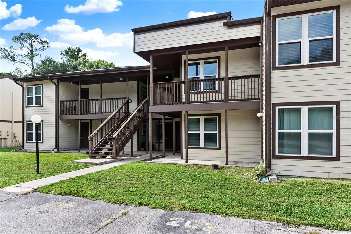 Property Slideshow image 1 of 43 | 23202 sandalwood dr 202, Wildwood, FL, 34785
