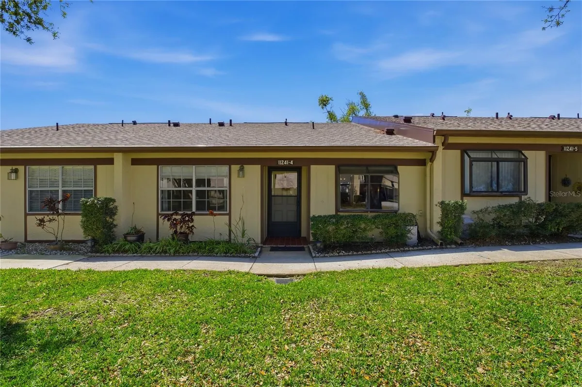 Property Slideshow image 1 of 47 | 11241 dollar lake dr 4, Port Richey, FL, 34668