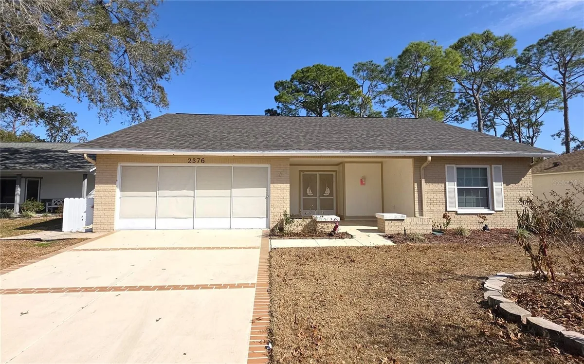 Property Slideshow image 1 of 23 | 2376 bent pine ct, Spring Hill, FL, 34606