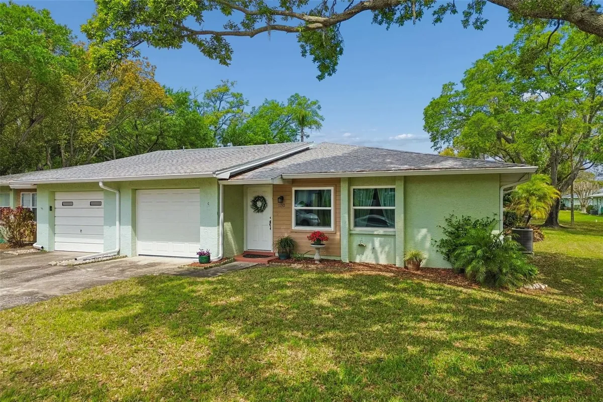 Property Slideshow image 1 of 37 | 1130 orange tree cir c, Palm Harbor, FL, 34684