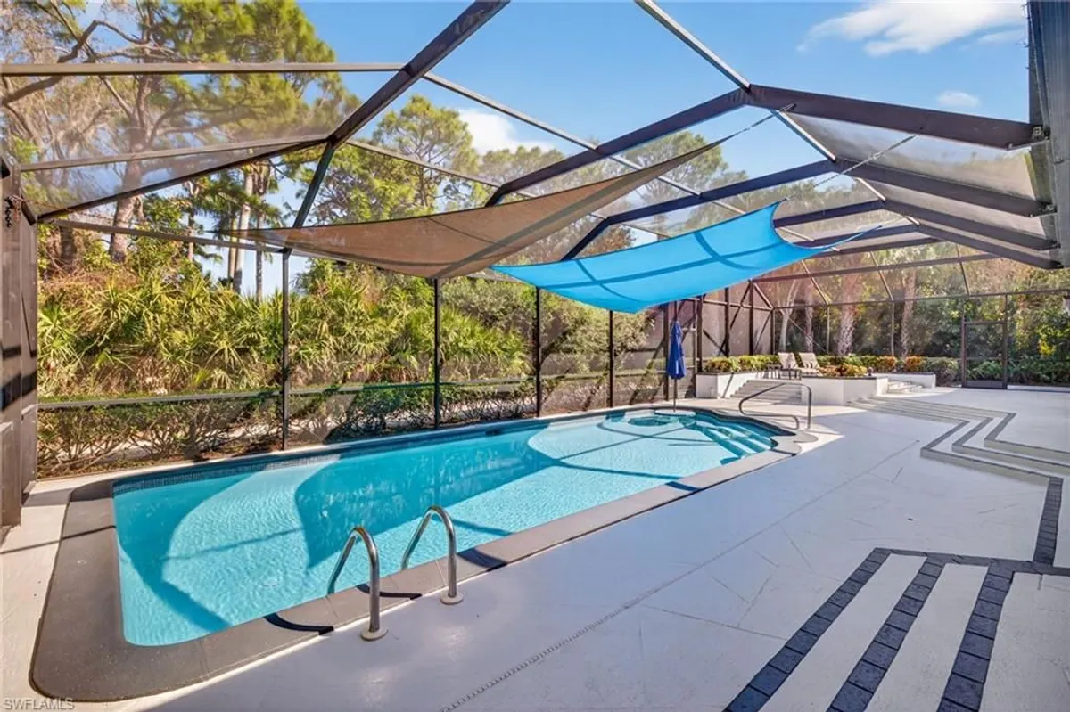 Property Slideshow image 1 of 50 | 3809 woodlake dr, Bonita Springs, FL, 34134