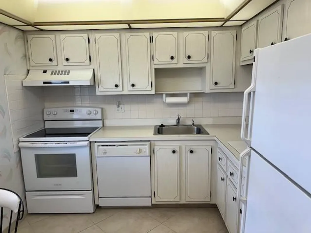 Property Slideshow image 1 of 25 | 7805 w atlantic blvd 202, Margate, FL, 33063