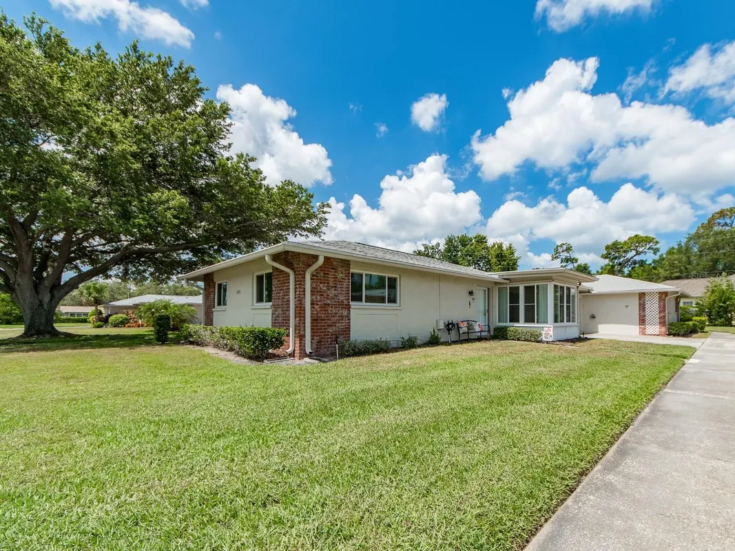 Property Slideshow image 1 of 27 | 1009 queen anne dr b, Palm Harbor, FL, 34684