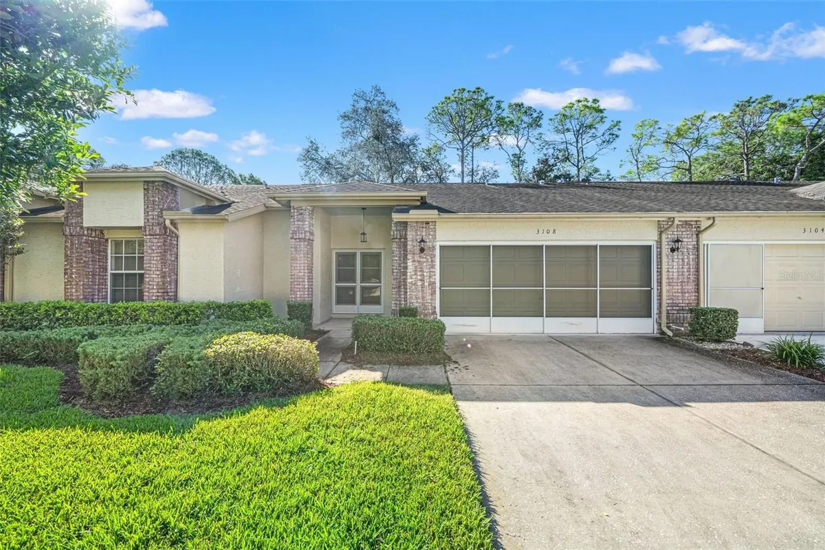 Property Slideshow image 1 of 62 | 3108 appleblossom trl, Spring Hill, FL, 34606
