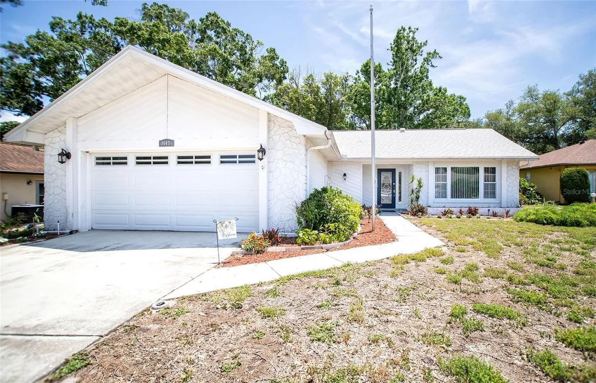 Property Slideshow image 1 of 16 | 1647 bentley ct, Palm Harbor, FL, 34684