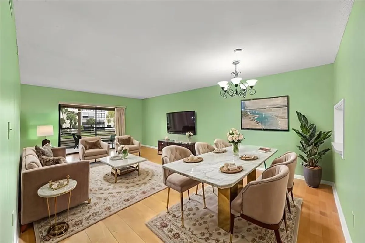 Property Slideshow image 1 of 64 | 4940 e sabal palm blvd apt 202, Tamarac, FL, 33319