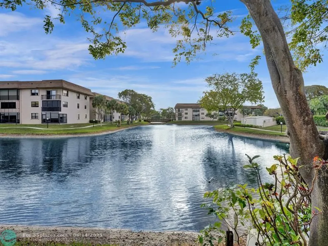 Property Slideshow image 1 of 43 | 6080 n sabal palm blvd 305, Tamarac, FL, 33319