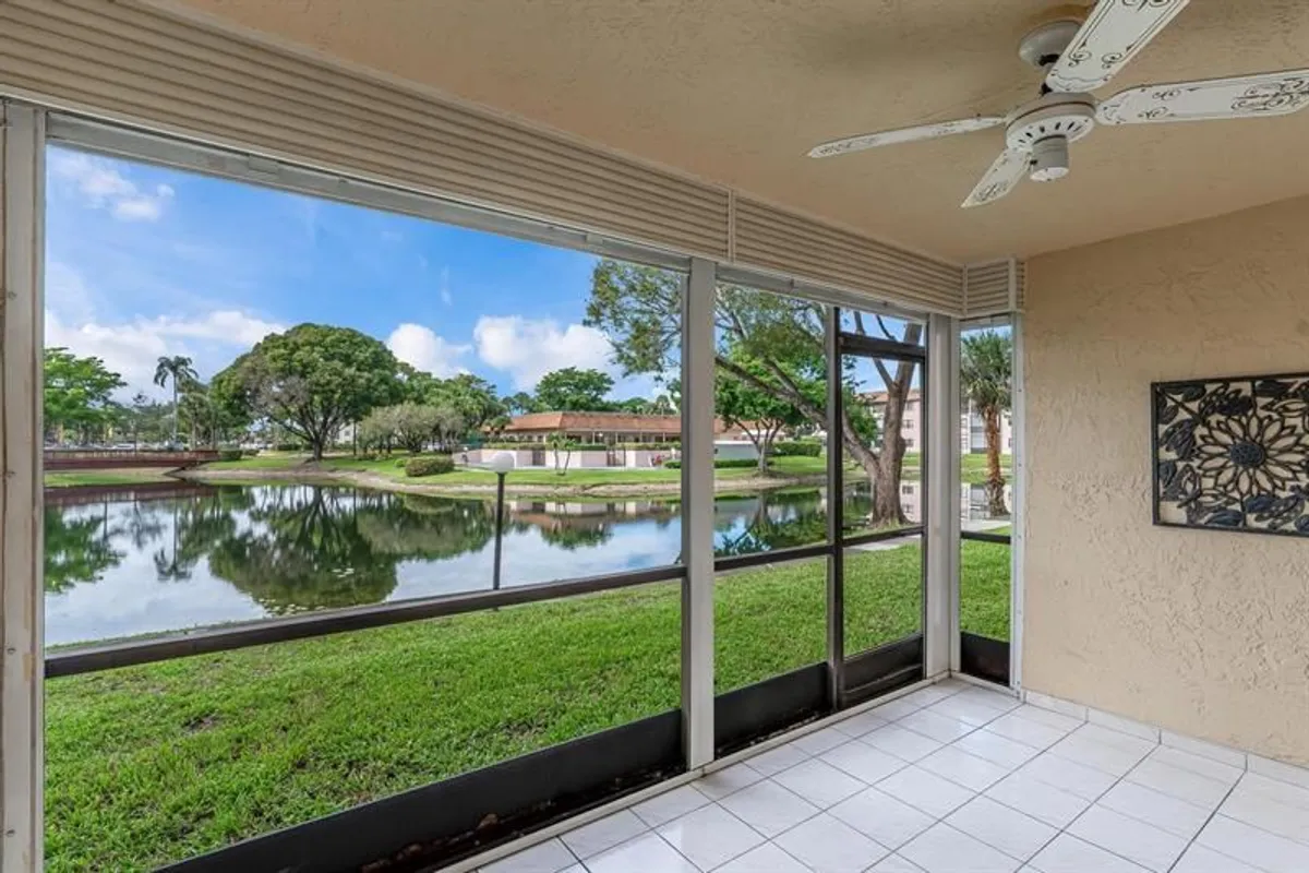 Property Slideshow image 1 of 32 | 4955 e sabal palm blvd 104, Tamarac, FL, 33319
