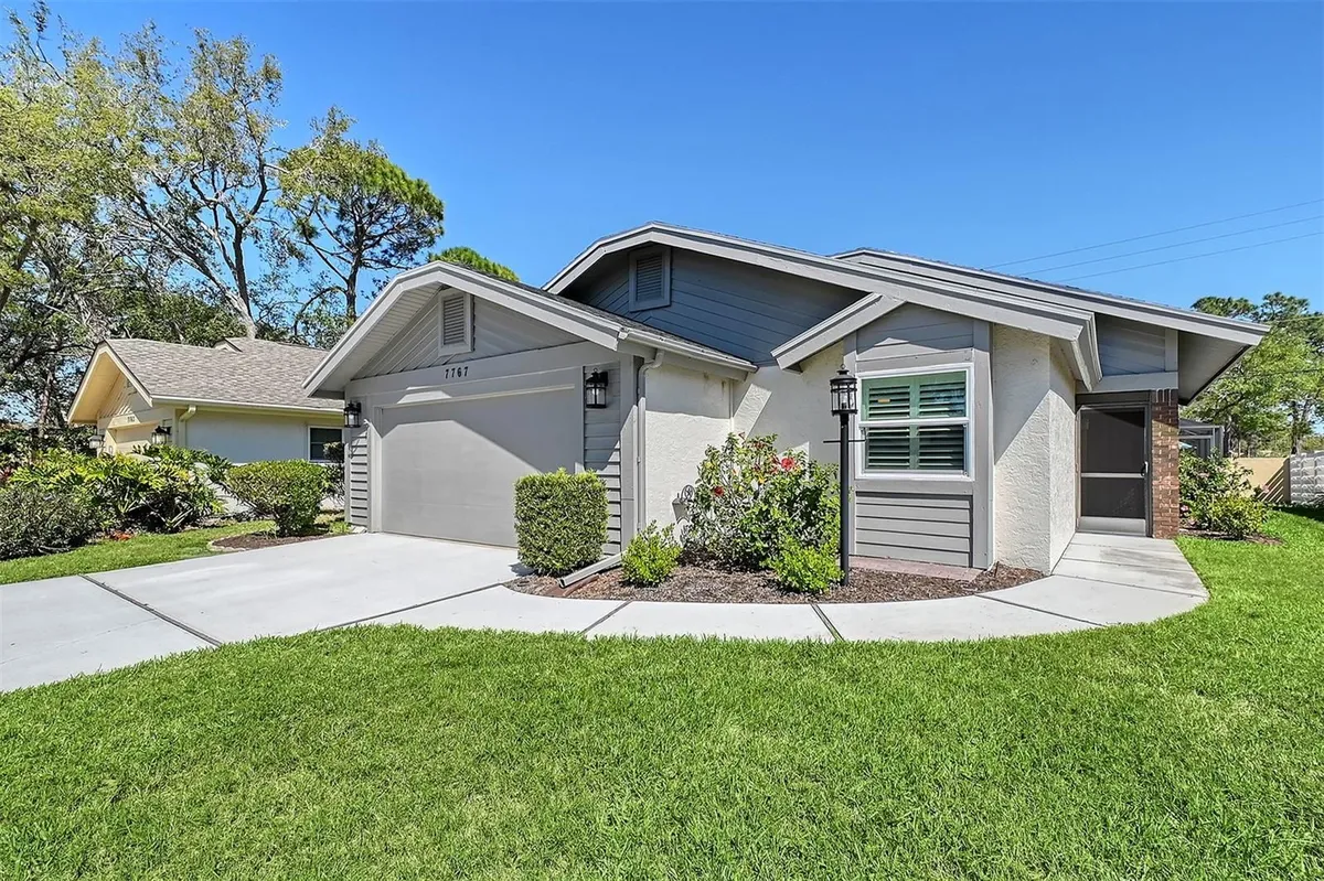 Property Slideshow image 1 of 60 | 7767 pine trace dr, Sarasota, FL, 34243