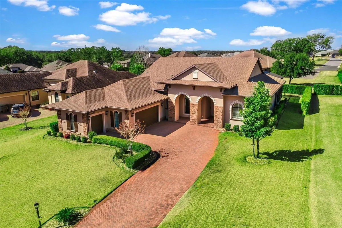 Property Slideshow image 1 of 65 | 39513 hillrise ln, Lady Lake, FL, 32159