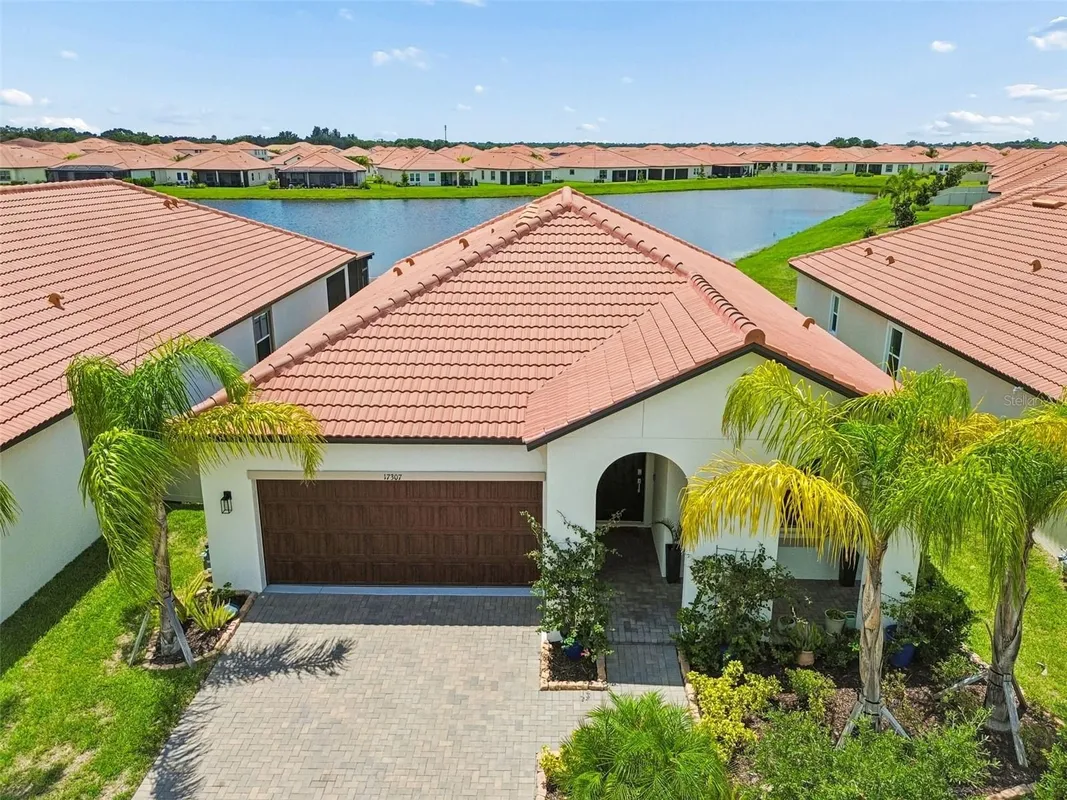 Property Slideshow image 1 of 47 | 17307 blue walk st, Wimauma, FL, 33598